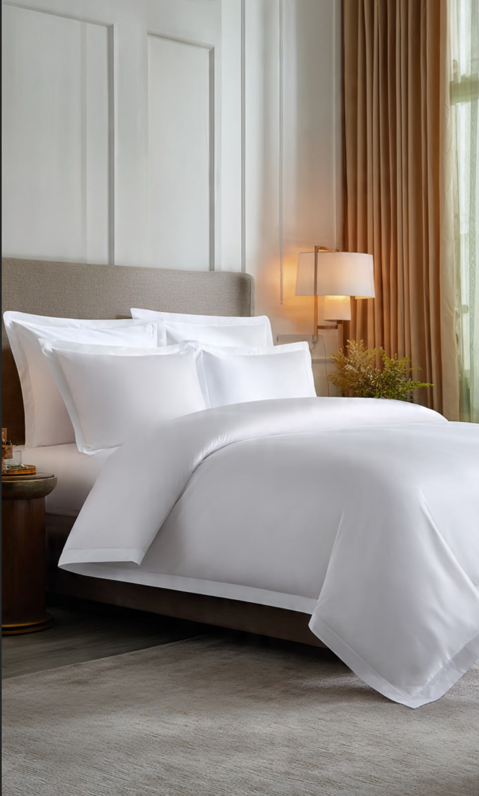 Luxury sateen cotton bedsheets on a hotel bed